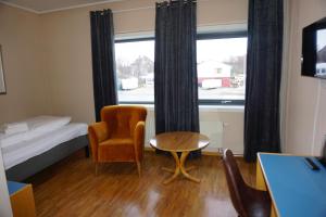 Postel nebo postele na pokoji v ubytování Verdde Hotel Lakselv