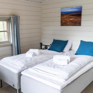 Postel nebo postele na pokoji v ubytování Gargia Lodge
