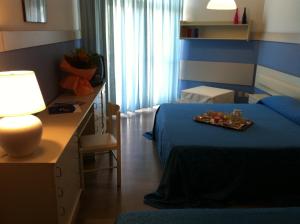 Posteľ alebo postele v izbe v ubytovaní Hotel Select