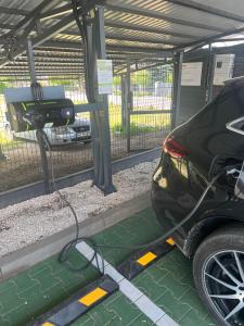 a car is being charged at a charging station at Kamienica nr 6 in Aleksandrów Łódzki