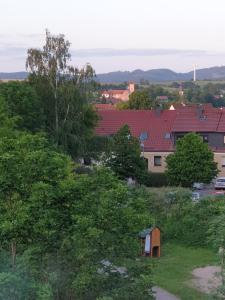 a view of a town with trees and buildings at Apartment nah am Strand in BreitungenWerra in Herrenbreitungen