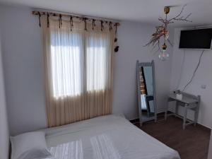 Postel nebo postele na pokoji v ubytování Luna