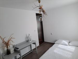 Postel nebo postele na pokoji v ubytování Luna