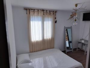 Postel nebo postele na pokoji v ubytování Luna