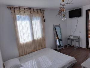 Postel nebo postele na pokoji v ubytování Luna
