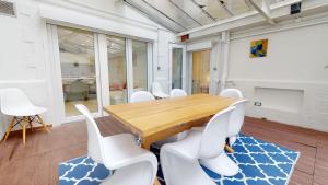 Posedenie v ubytovaní Appartements modernes avec véranda