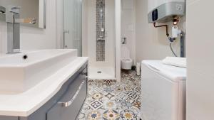 Kúpeľňa v ubytovaní Appartements modernes avec véranda