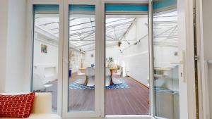 Fotografia z galérie ubytovania Appartements modernes avec véranda v Štrasburgu