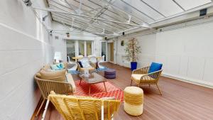 Posedenie v ubytovaní Appartements modernes avec véranda