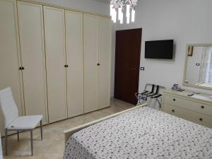 Postel nebo postele na pokoji v ubytování Casa Zibè