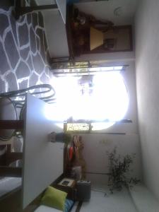 a small room with a window in a room at Villa Belmar Self-Catered Apartments in Eretria +73 photos