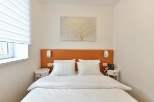 Letto o letti in una camera di Royal Wellness and Spa