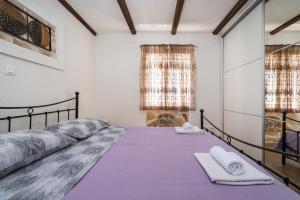Postel nebo postele na pokoji v ubytování Stone House