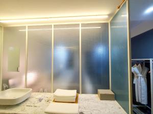Ένα ή περισσότερα κρεβάτια σε δωμάτιο στο JS Boutique Hotel
