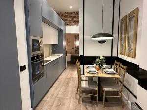 Kuchyň nebo kuchyňský kout v ubytování APARTAMENTOS ALCALA
