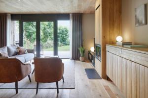 TV a/nebo společenská místnost v ubytování Nheu d'Arties by FeelFree Rentals