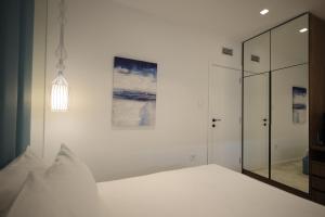 Letto o letti in una camera di Royal Wellness and Spa