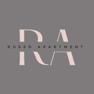 un logotipo para la organización rissosarmaarma en Russo Apartment, en Termoli