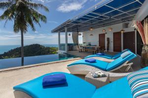 a villa with a view of the ocean at Villa La Moon Chaweng Noi 4BR in Koh Samui 