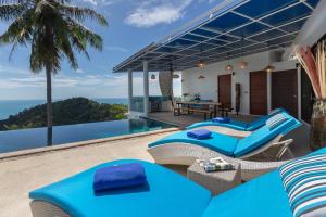 a villa with a view of the ocean at Villa La Moon Chaweng Noi 4BR in Koh Samui
