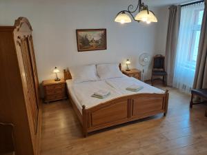 Postel nebo postele na pokoji v ubytování Řehořův dům