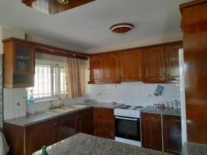 Kuchyň nebo kuchyňský kout v ubytování Maria’s House Kineta