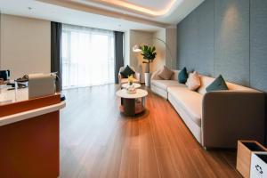 אזור ישיבה ב-Jingju Hotel Shenzhen