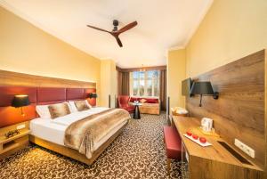 Das Gutenbrunn Thermen & Sporthotel客房内的一张或多张床位