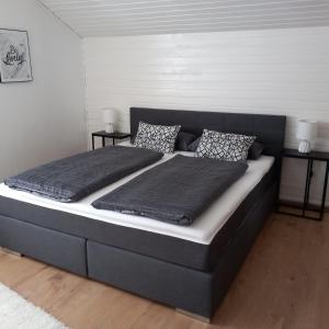 Katil atau katil-katil dalam bilik di Ferienwohnung Heinzelfrauchen