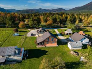 an aerial view of a farm with a house at Apartments Marija in Vrelo Koreničko