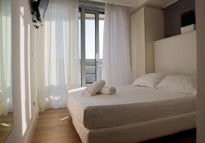 Postel nebo postele na pokoji v ubytování Boutique Hotel Bali + 37 fotografií
