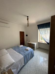 Postel nebo postele na pokoji v ubytování Il Nodo