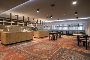 Restaurace v ubytování Hotel Nomad