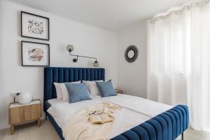 Postel nebo postele na pokoji v ubytování Apartments Marina