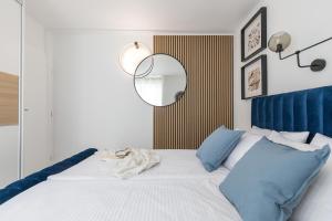 Postel nebo postele na pokoji v ubytování Apartments Marina