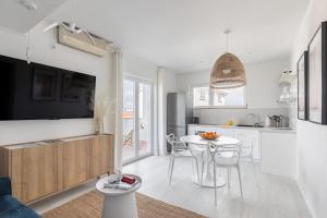 Kuchyň nebo kuchyňský kout v ubytování Apartments Marina