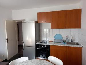 Kuchyň nebo kuchyňský kout v ubytování Vodice, apartmani Buntić