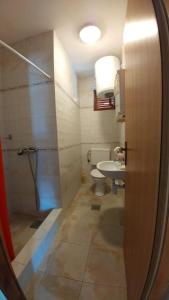 Koupelna v ubytování Vodice, apartmani Buntić