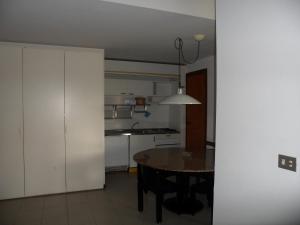 Eldhús eða eldhúskrókur á Appartamento 109 - Multiproprietà I Boboli BC