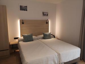 Hotel Coral Boutique by gaiarooms客房内的一张或多张床位