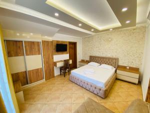 Ένα ή περισσότερα κρεβάτια σε δωμάτιο στο Apart Hotel Llolla