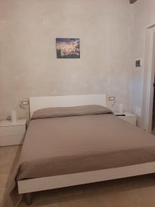 Postel nebo postele na pokoji v ubytování Casolare 67