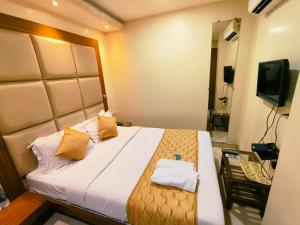 TV a/nebo společenská místnost v ubytování Apex Hotel
