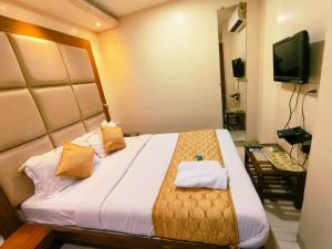 TV a/nebo společenská místnost v ubytování Apex Hotel