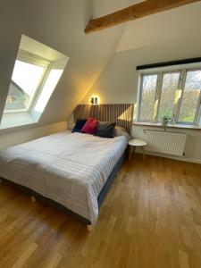 Cama o camas de una habitación en Jelling