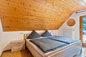 Postel nebo postele na pokoji v ubytování Ferienhaus Gießler
