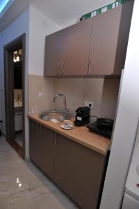 Cuina o zona de cuina de Jacuzzi Apartman De Lux - Cacak