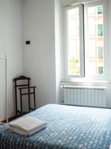 Кровать или кровати в номере Soffio Di Mare