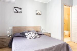 A bed or beds in a room at Mary's House