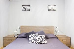 A bed or beds in a room at Mary's House